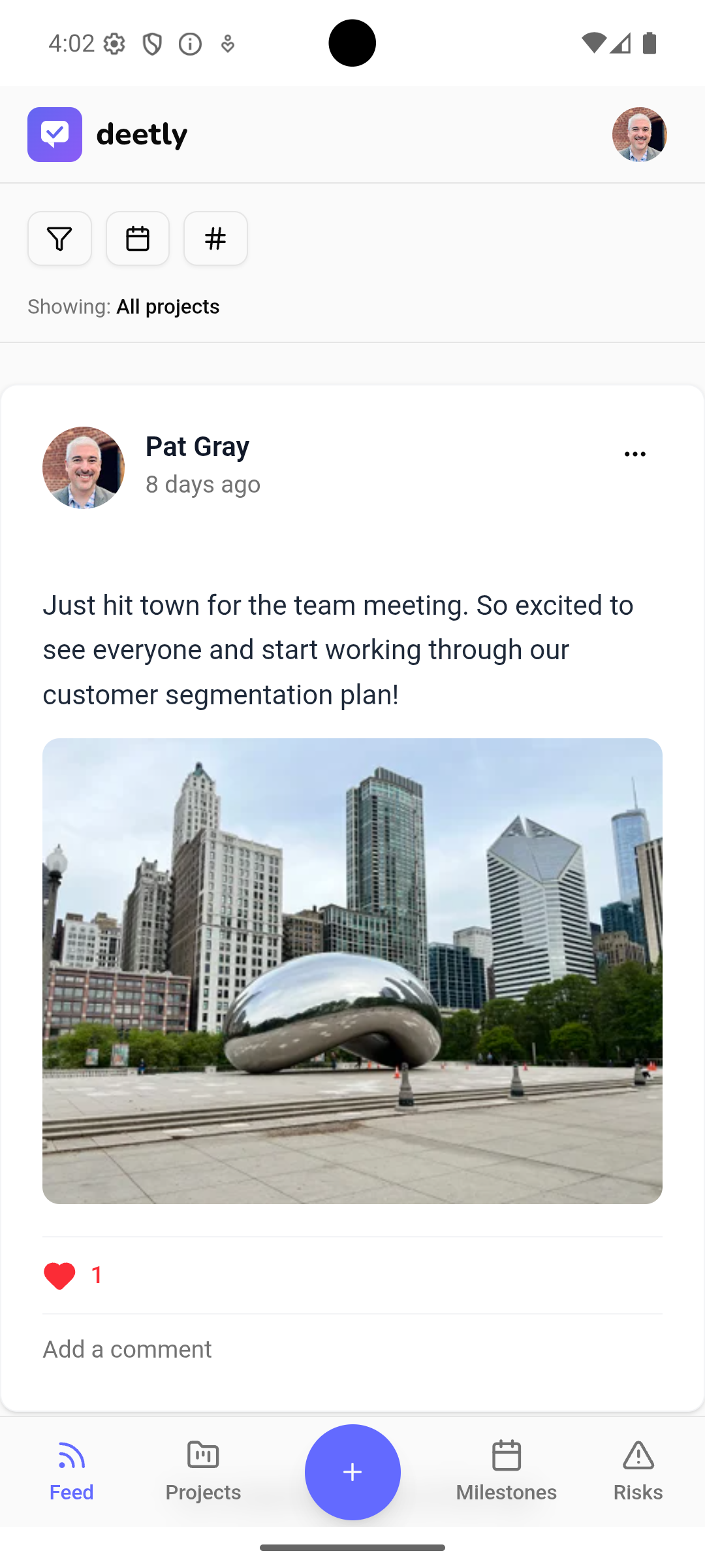 A smartphone showing the deetly status feed